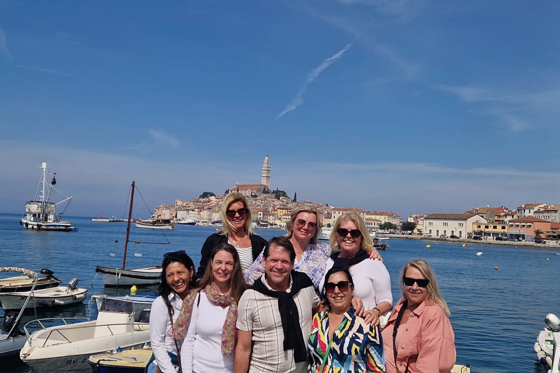 Travelers gathered beside the Adriatic in Rovinj